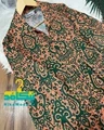 پیراهن ساحلی سرمه سبز نارنجی